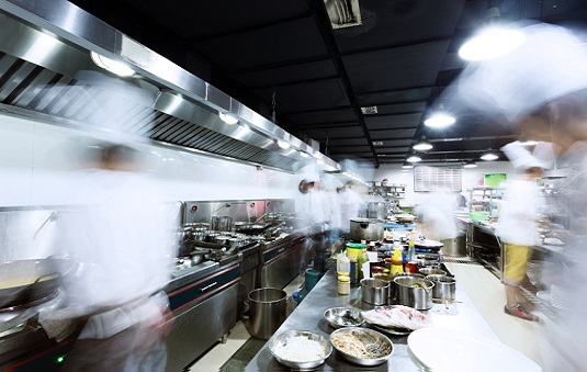 modern kitchen and busy chefs 